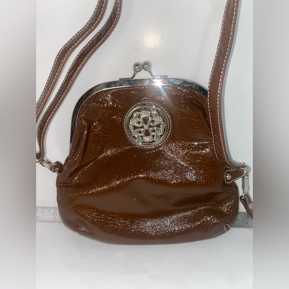 Patent Brown Crossbody Bag with Silver Medallion Accent